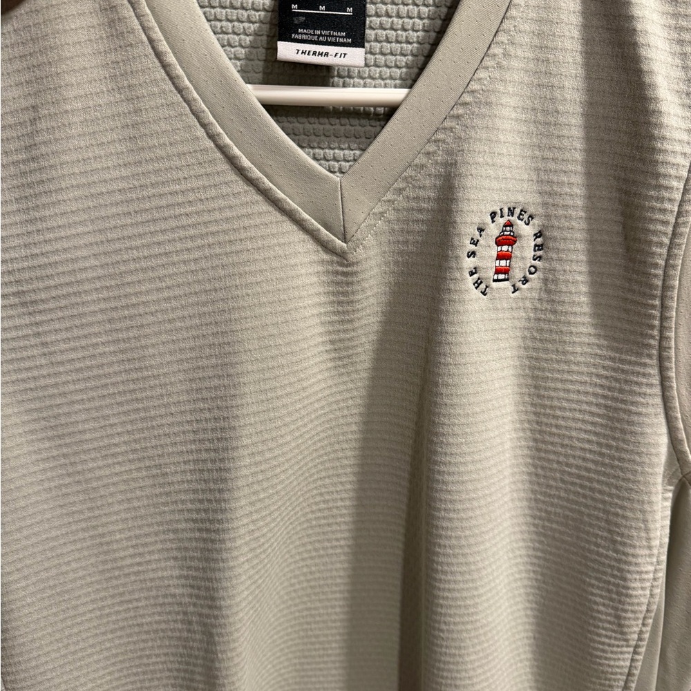Nike Men's V-Neck Performance Sweater in Light Cream with Red Accent